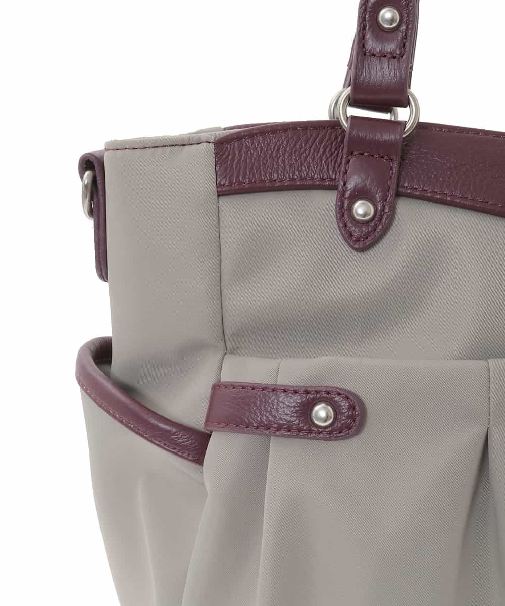 BKRAD31180 MK MICHEL KLEIN BAG(MK ミッシェルクラン バッグ) [撥水/2WAY/A4収納可]サイドポケットパイピングバッグ グレージュ×パープル