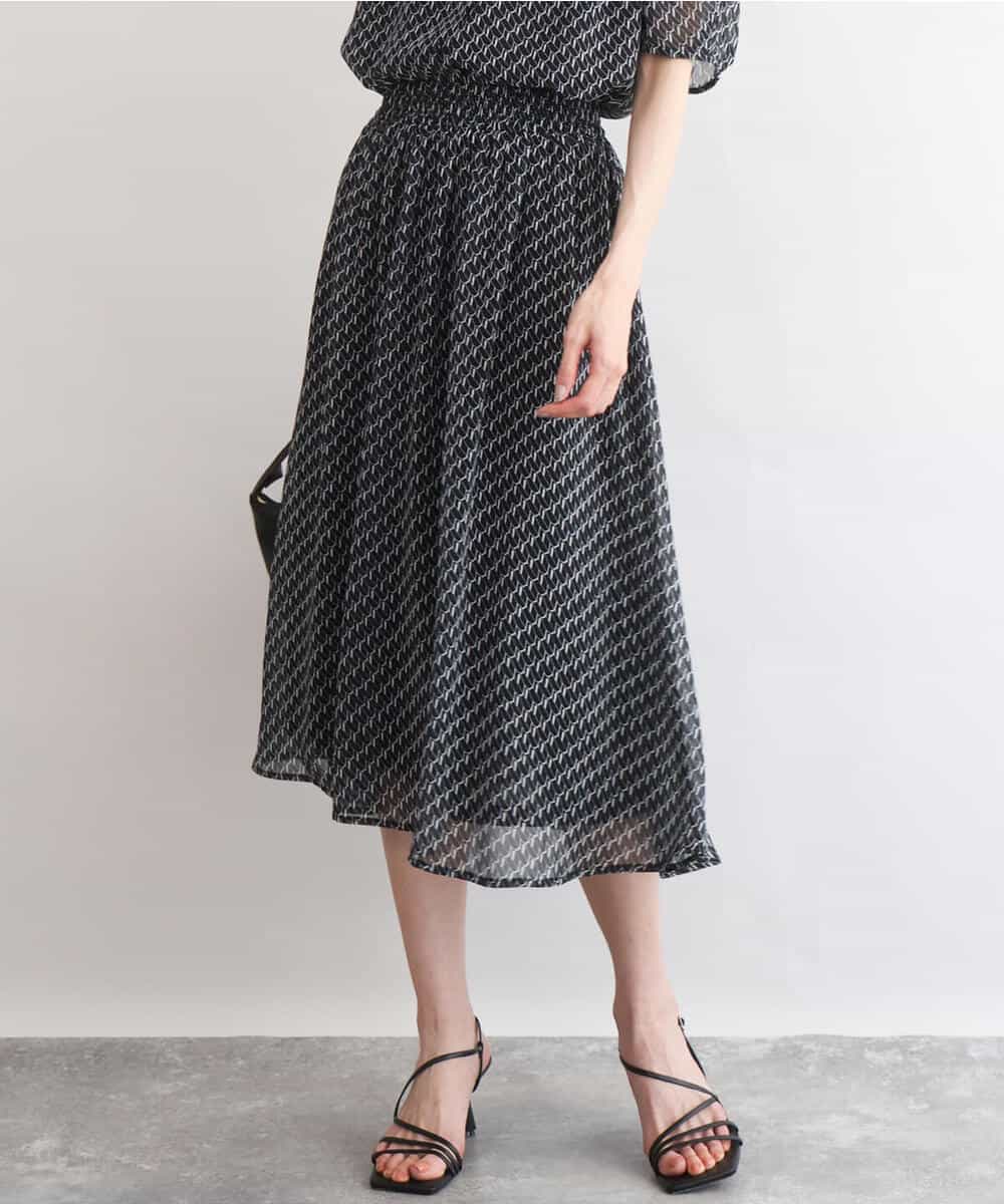 FKHGD06140 MK MICHEL KLEIN(MK ミッシェルクラン) [洗える]幾何柄シフォンスカート ブラウン