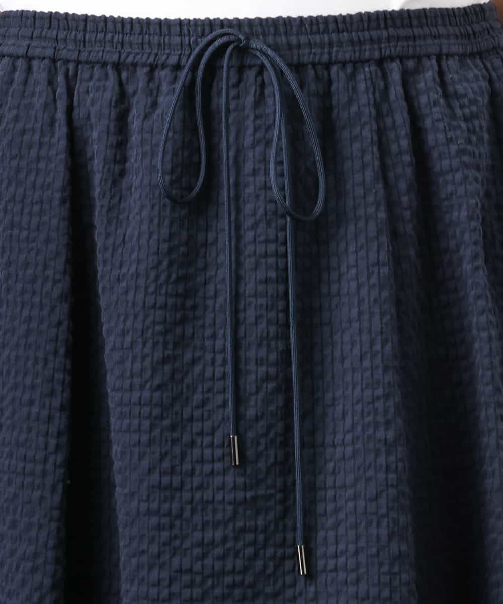 FMHGD05240 MICHEL KLEIN(ミッシェルクラン) [セットアップ対応/リラックスボトム]ワッフルギャザースカート ネイビー